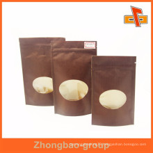 Customized size kraft nuts paper bag with oval window and zipper manufacturer